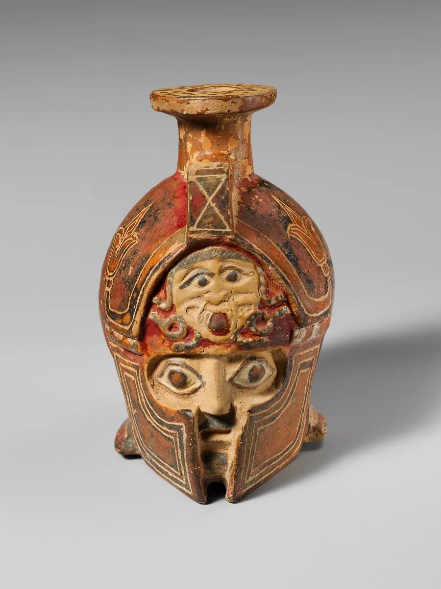 Terracotta aryballos in the form of a helmeted head — Unknown
