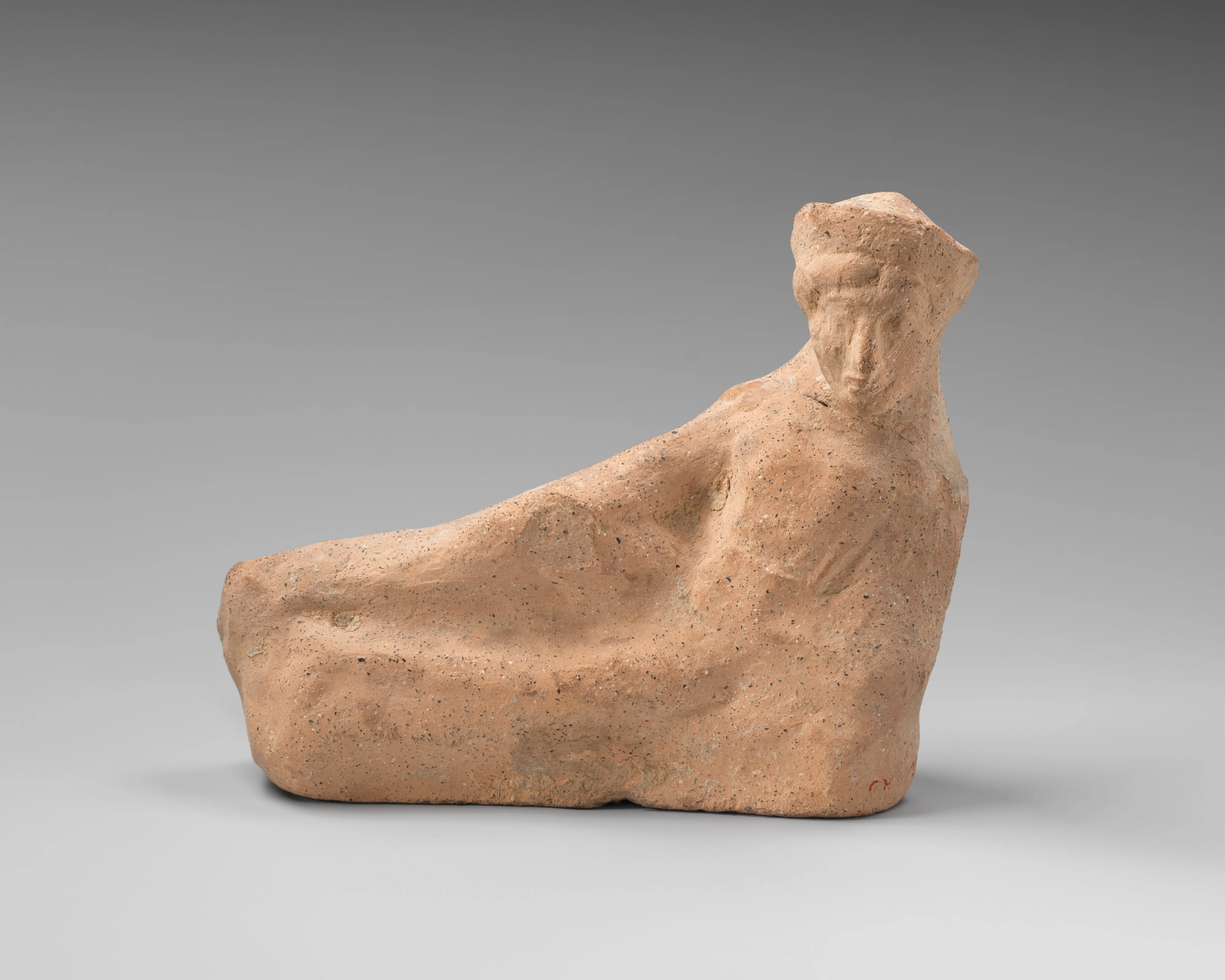 Terracotta statuette of a reclining youth — Unknown