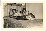 [Georgette Maury and André Maury Reclining on Bed, Juan-les-Pins, France]