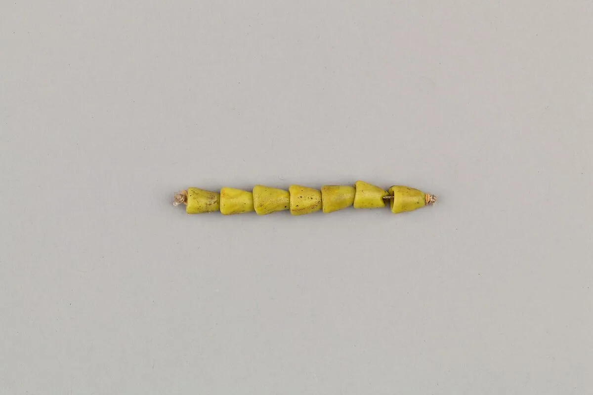 String of 7 beads — Unknown