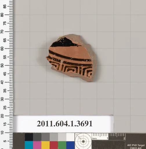 Terracotta fragment of a kylix (drinking cup)