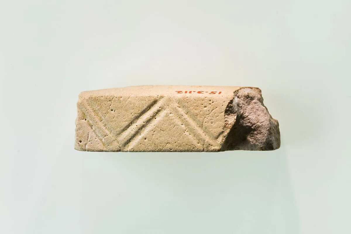 A fragment of a cubic unknown object, possibly a fragment of a rod — Unknown