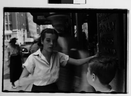 [Two 35mm Film Frames: Young Woman and Boy Standing on Street, New York City]