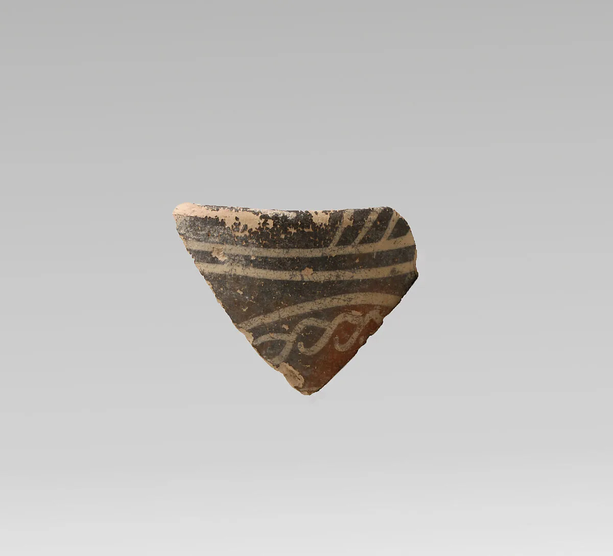 Terracotta rim fragment with quirks and bands — Unknown