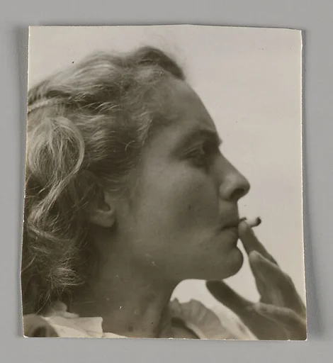 [Eleanor Clark Smoking, on Roof of 441 East 92nd Street Apartment Building, New York City]