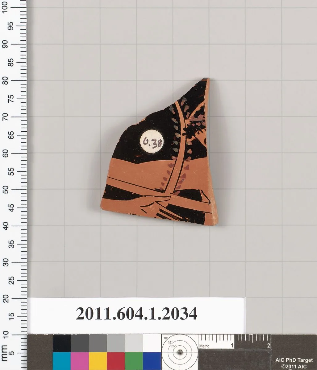 Terracotta rim fragment of a kylix (drinking cup) — Unknown