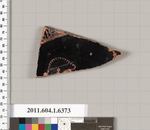 Terracotta fragment of a kylix (drinking cup)