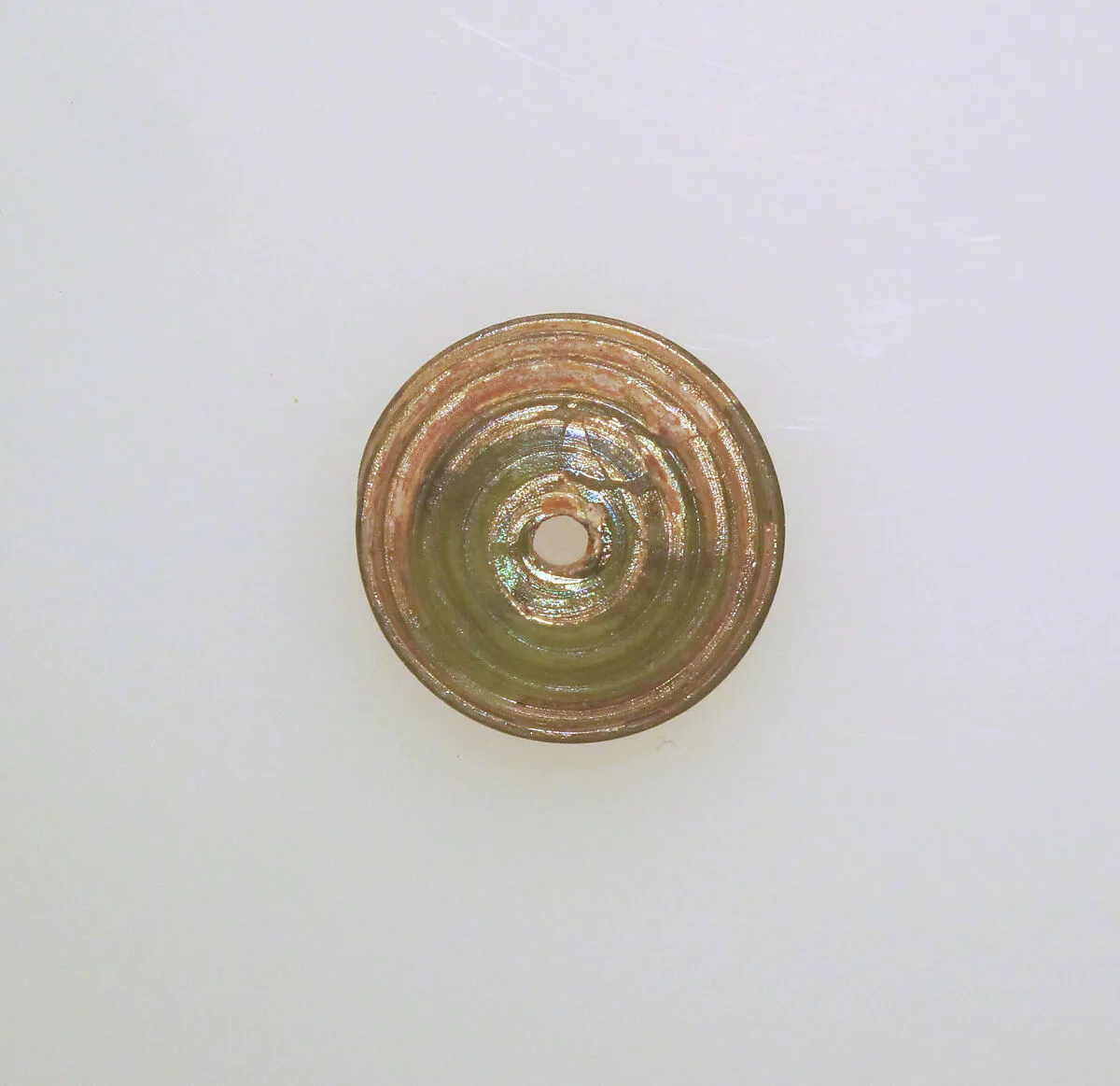 Glass spindle whorl — Unknown