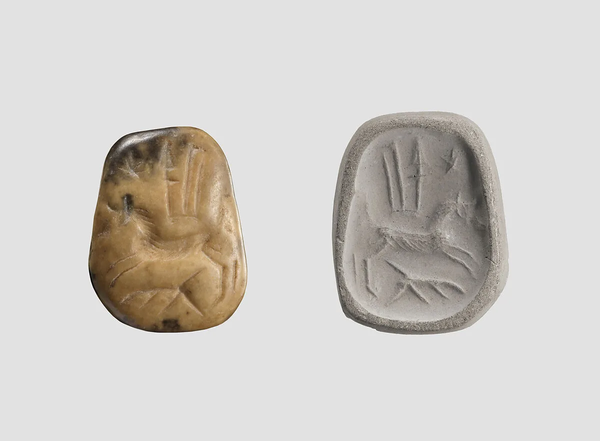 Stamp seal (octagonal pyramid, worn) with divine symbols — Unknown