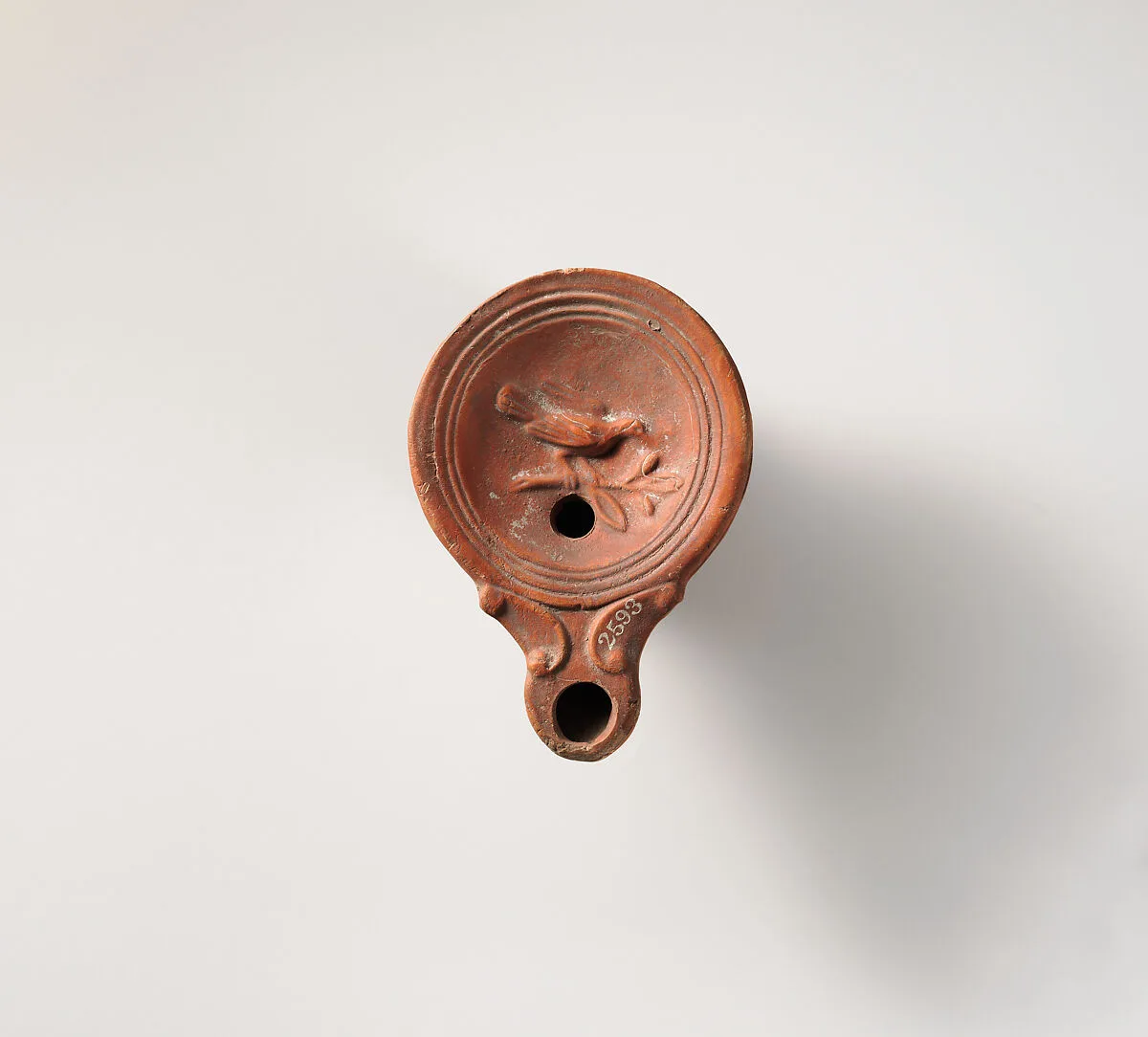 Terracotta oil lamp — Unknown