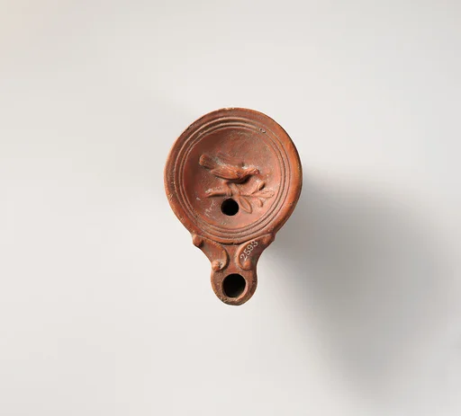 Terracotta oil lamp