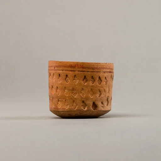 Cup with three rows of impressed decoration