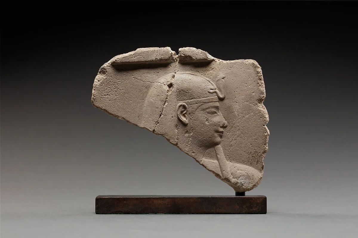 Relief plaque depicting a royal figure — Unknown