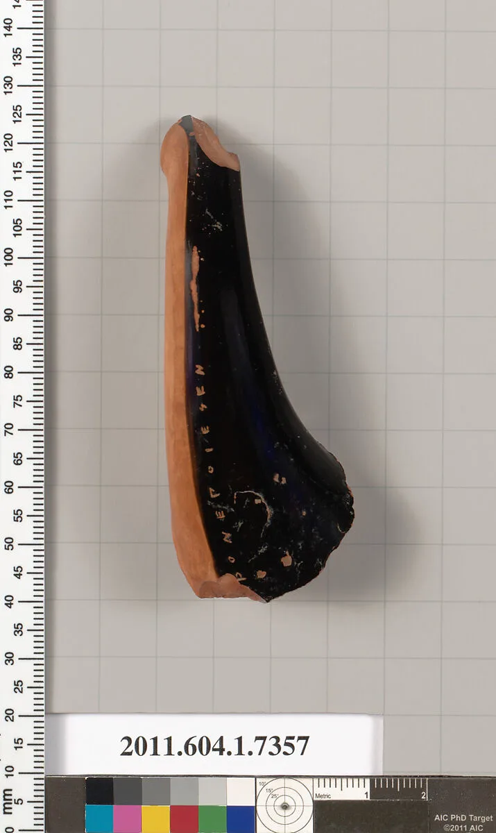 Terracotta fragment of a kylix (drinking cup) — Makron