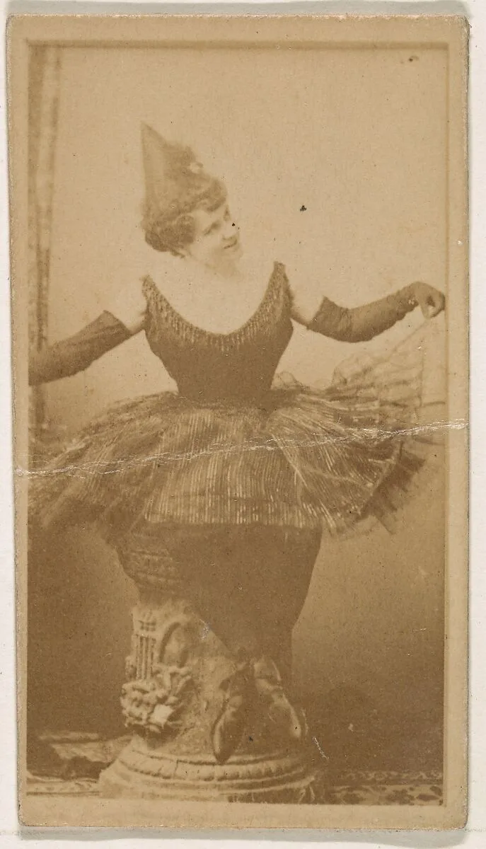 Seated dancer holding skirt, from the Actresses series (N245) issued by Kinney Brothers to promote Sweet Caporal Cigarettes — Kinney Brothers Tobacco Company
