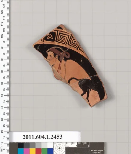 Terracotta fragment of a kylix (drinking cup)