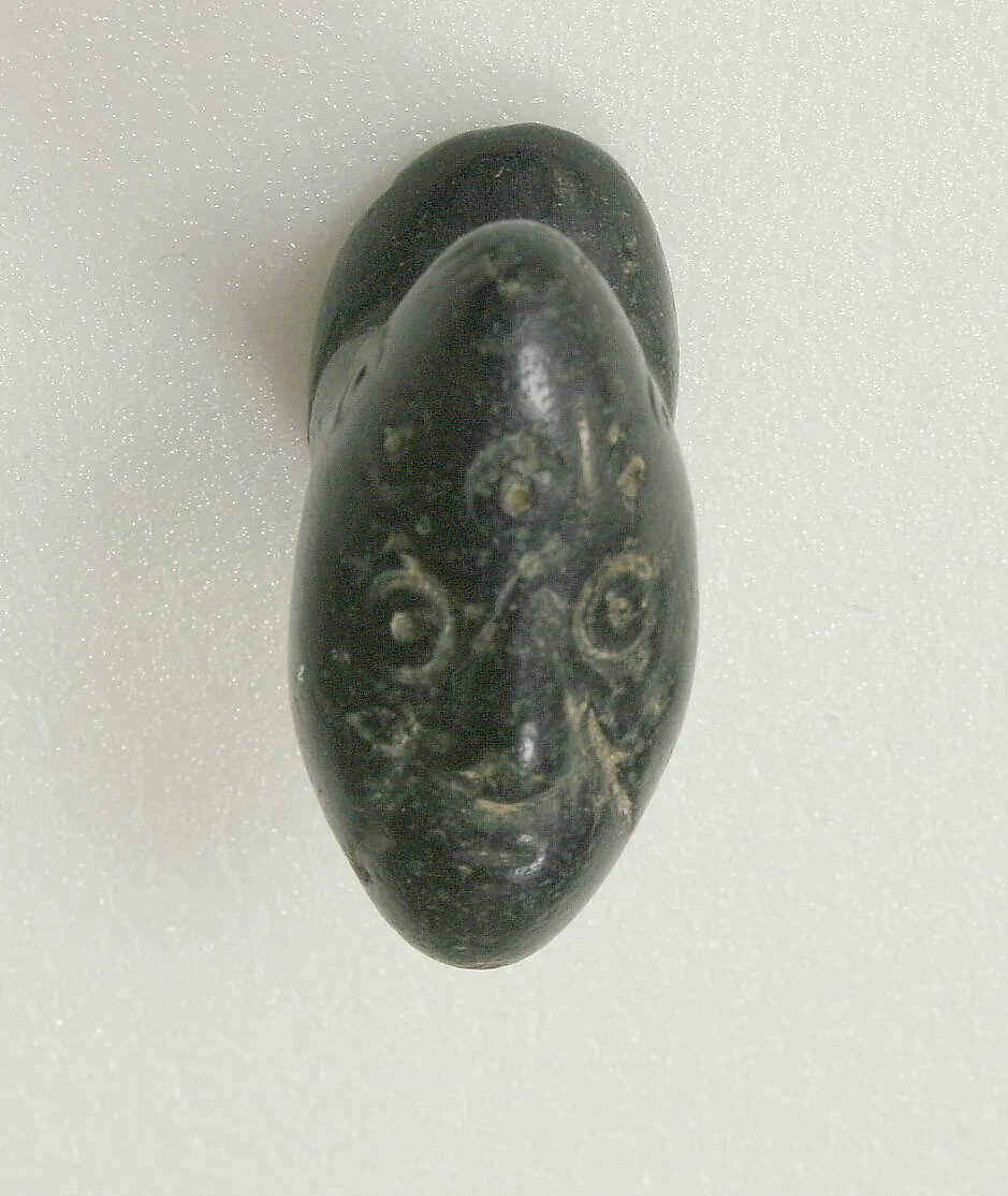 Elongated Stone Labret with Face — Unknown