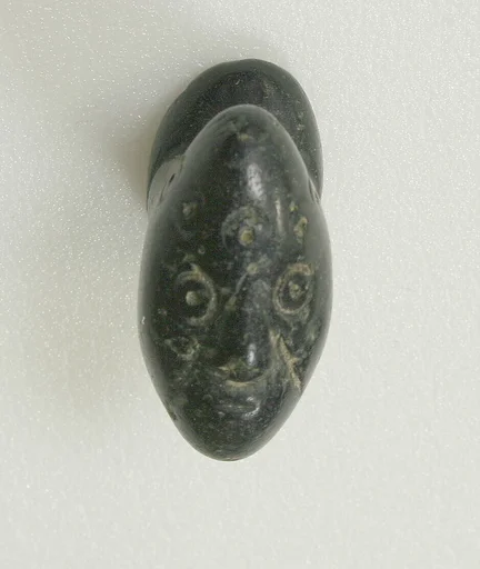 Elongated Stone Labret with Face