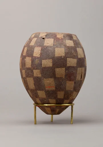 Jar decorated with checkerboard pattern