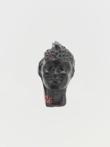 Glass pendant in the shape of a Black African’s head