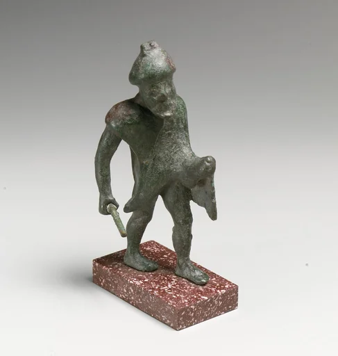 Statuette of a man with a stick