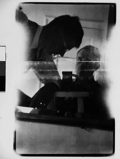 [Self-Portrait with Camera and Hanns Skolle in Mirror]