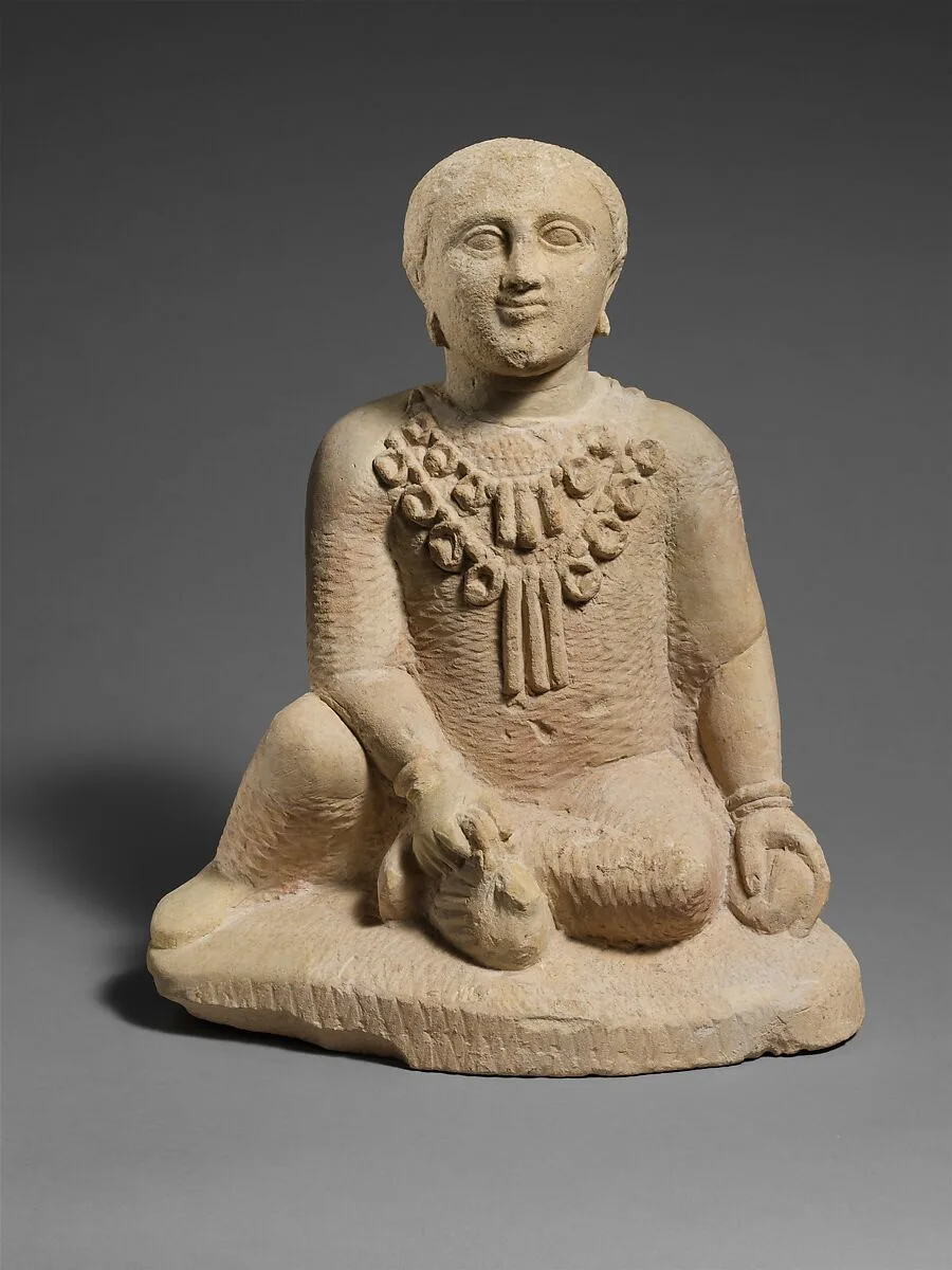 Limestone temple boy — Unknown