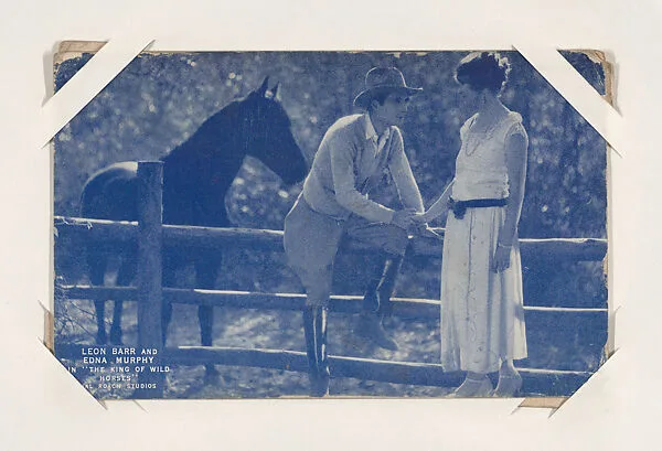 Leon Barr and Edna Murphy in "The King of Wild Horses" from Western Stars or Scenes Exhibit Cards series (W412) — Unknown