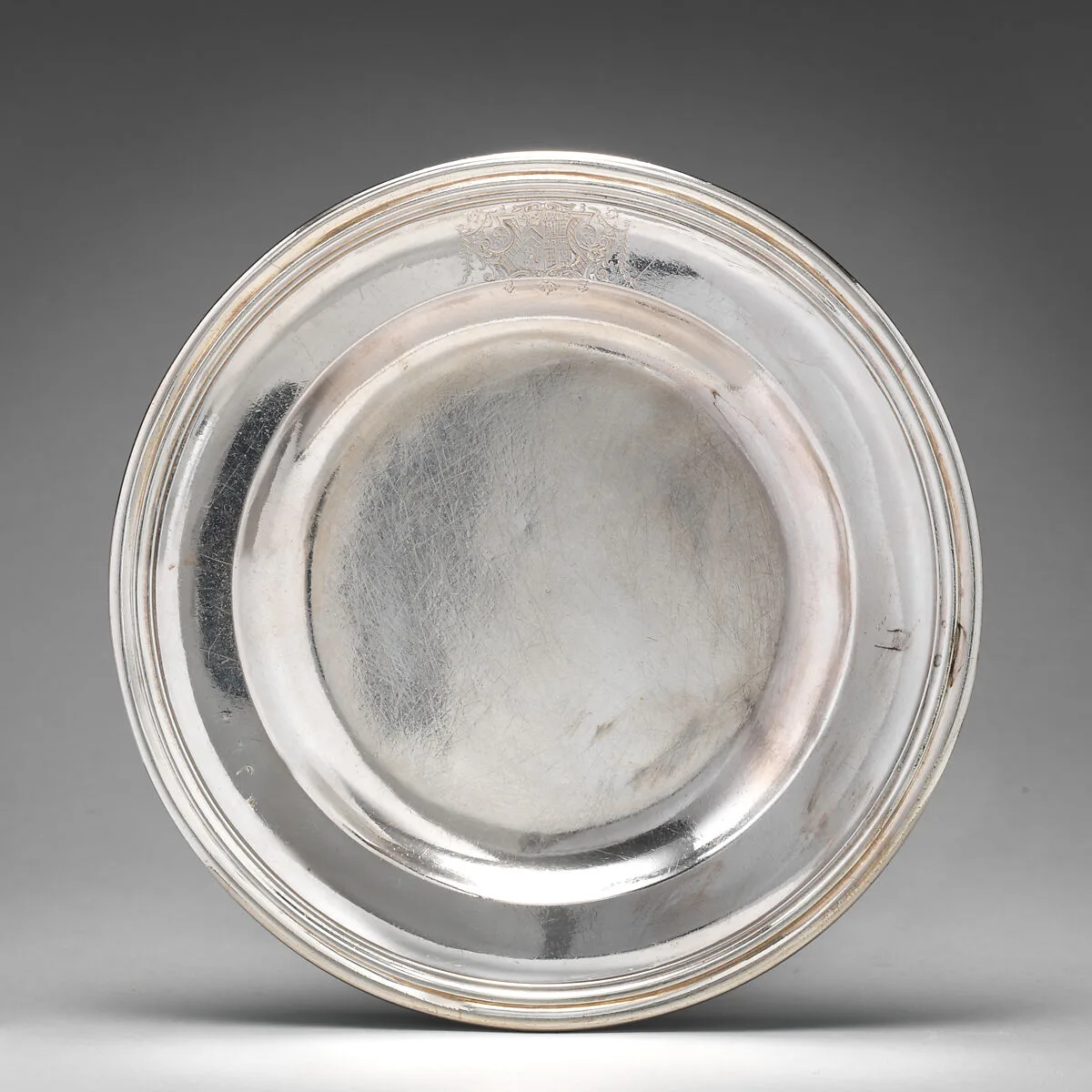 Dinner plate with English arms (one of a group of four) — Richard Bayley