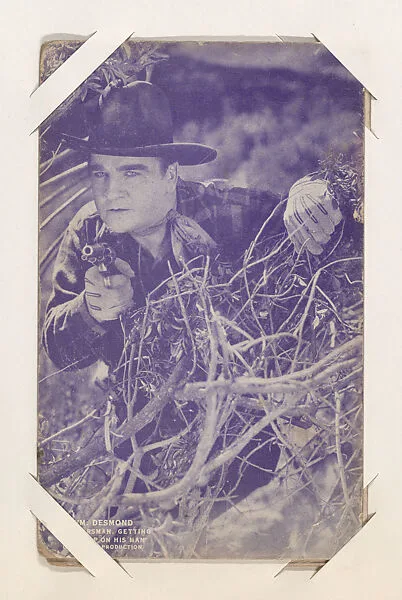 Wm. Desmond Frontiersman getting his drop on his man from Western Stars or Scenes Exhibit Cards series (W412) — Unknown