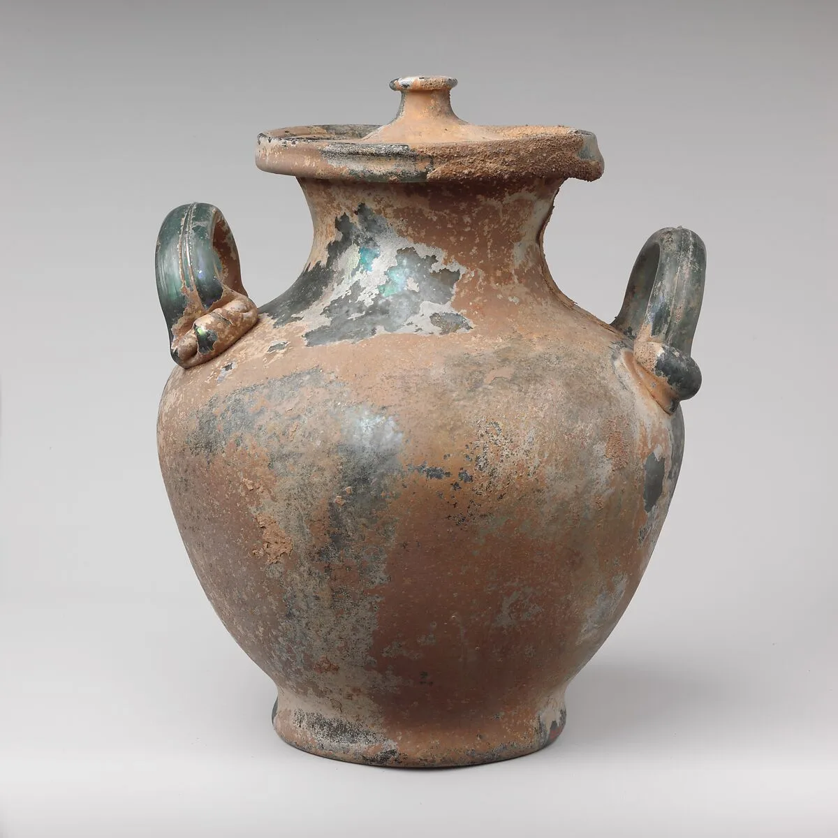 Glass cinerary urn with lid — Unknown
