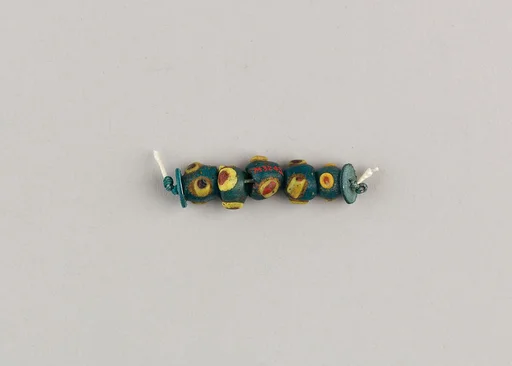 String of 5 eyed beads