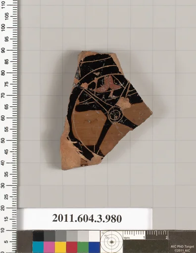 Terracotta fragment of a lekanis lid (covered dish)