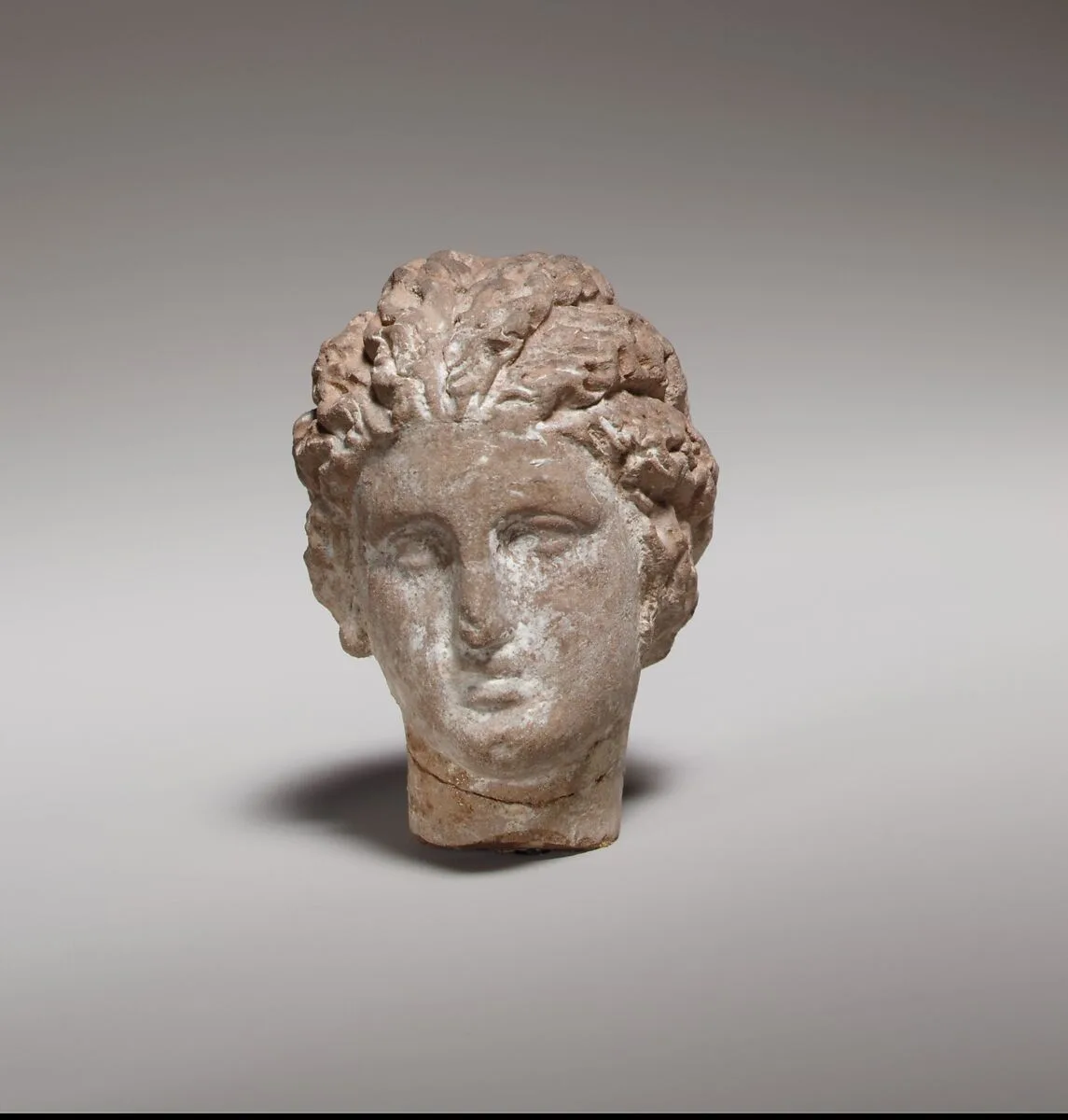 Terracotta head of a woman — Unknown