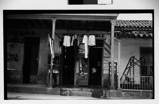 [Pool Room and Clothing Store Under Colonnade, Havana]