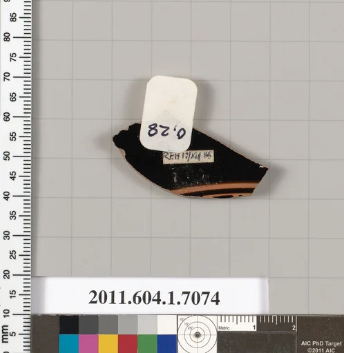 Terracotta fragment of a kylix (drinking cup)