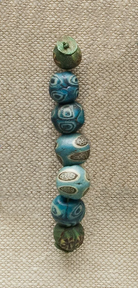 String of 7 Eyed Beads — Unknown