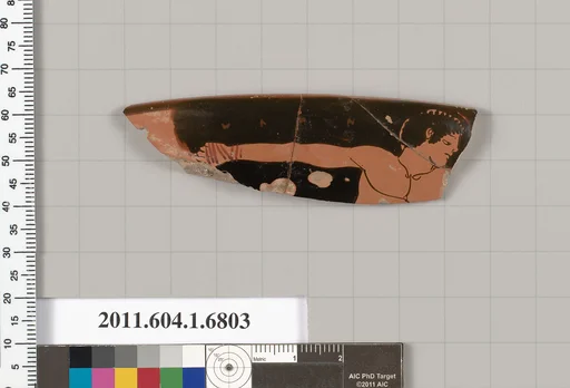 Terracotta rim fragment of a kylix (drinking cup)