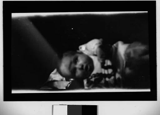 [Baby, Possibly Anita Skolle, with String of Beads]