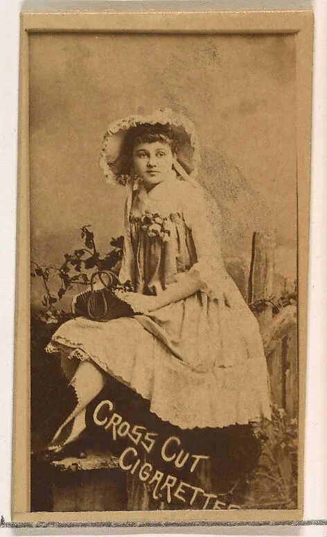 Seated actress holding bag, from the Actors and Actresses series (N145-1) issued by Duke Sons & Co. to promote Cross Cut Cigarettes — W. Duke, Sons & Co.