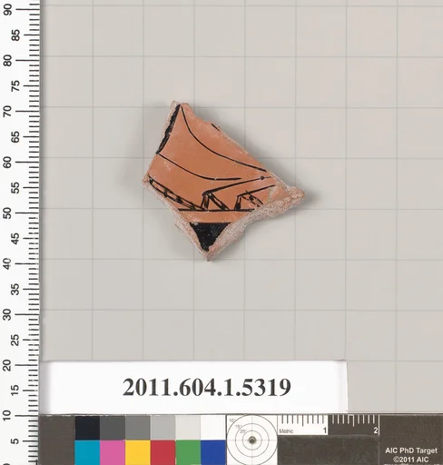 Terracotta fragment of a kylix (drinking cup)