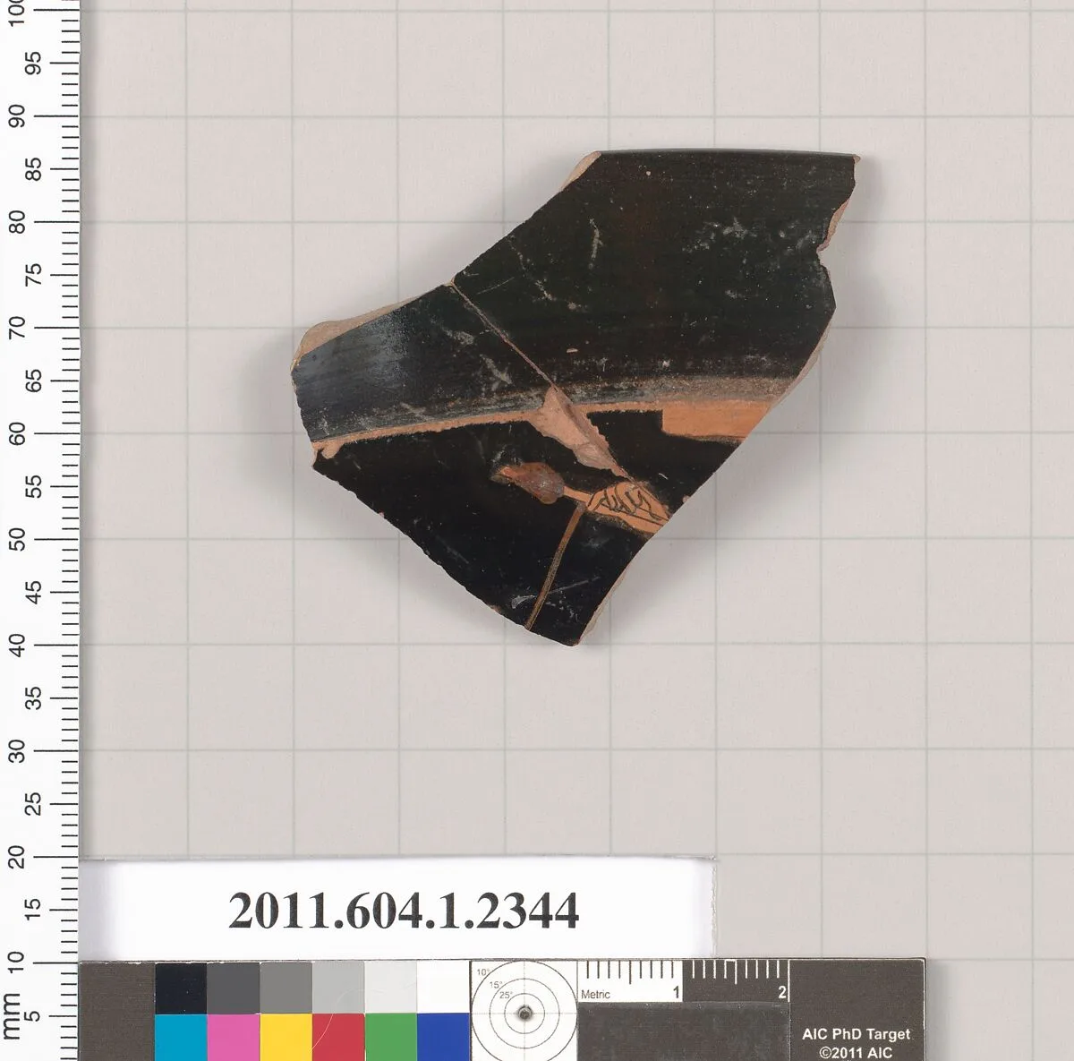 Terracotta rim fragment of a kylix (drinking cup) — Telephos Painter