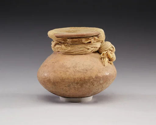 Cosmetic Jar Sealed with Linen