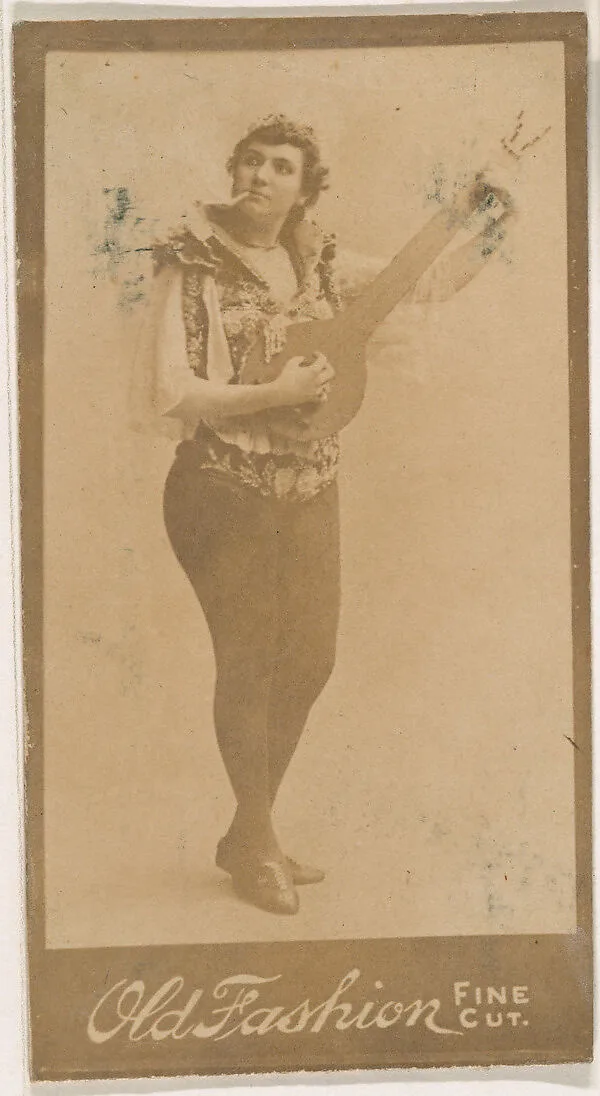 Actress playing mandolin and smoking cigarette, from the Actresses series (N664) promoting Old Fashion Fine Cut Tobacco — Unknown