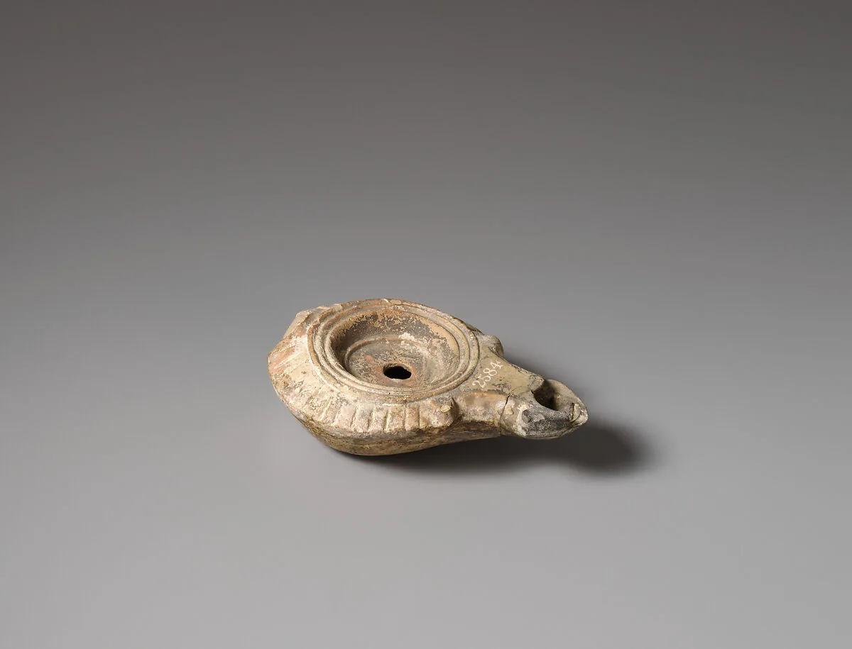 Terracotta oil lamp — Unknown