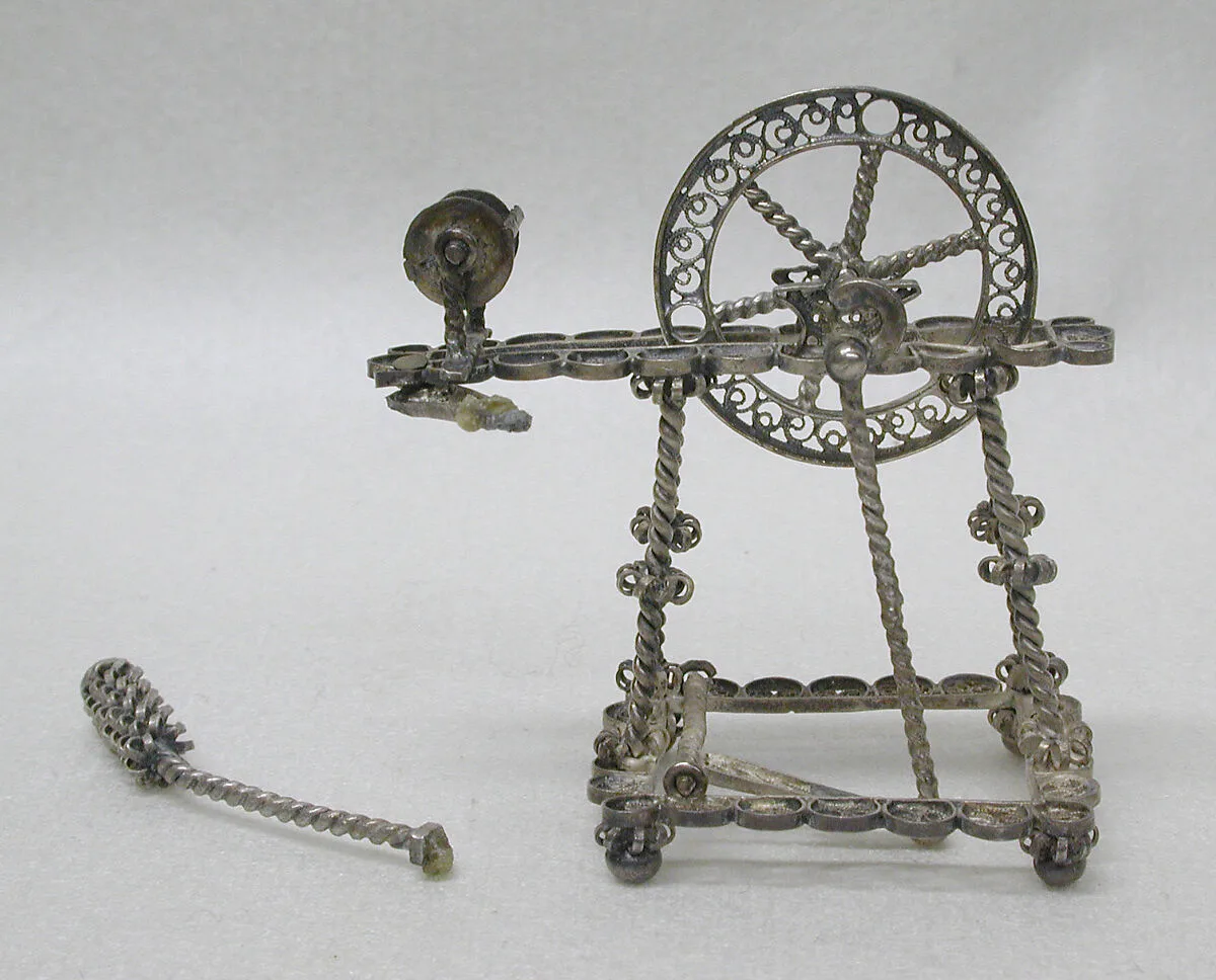 Miniature spinning wheel (part of a set) — Unknown