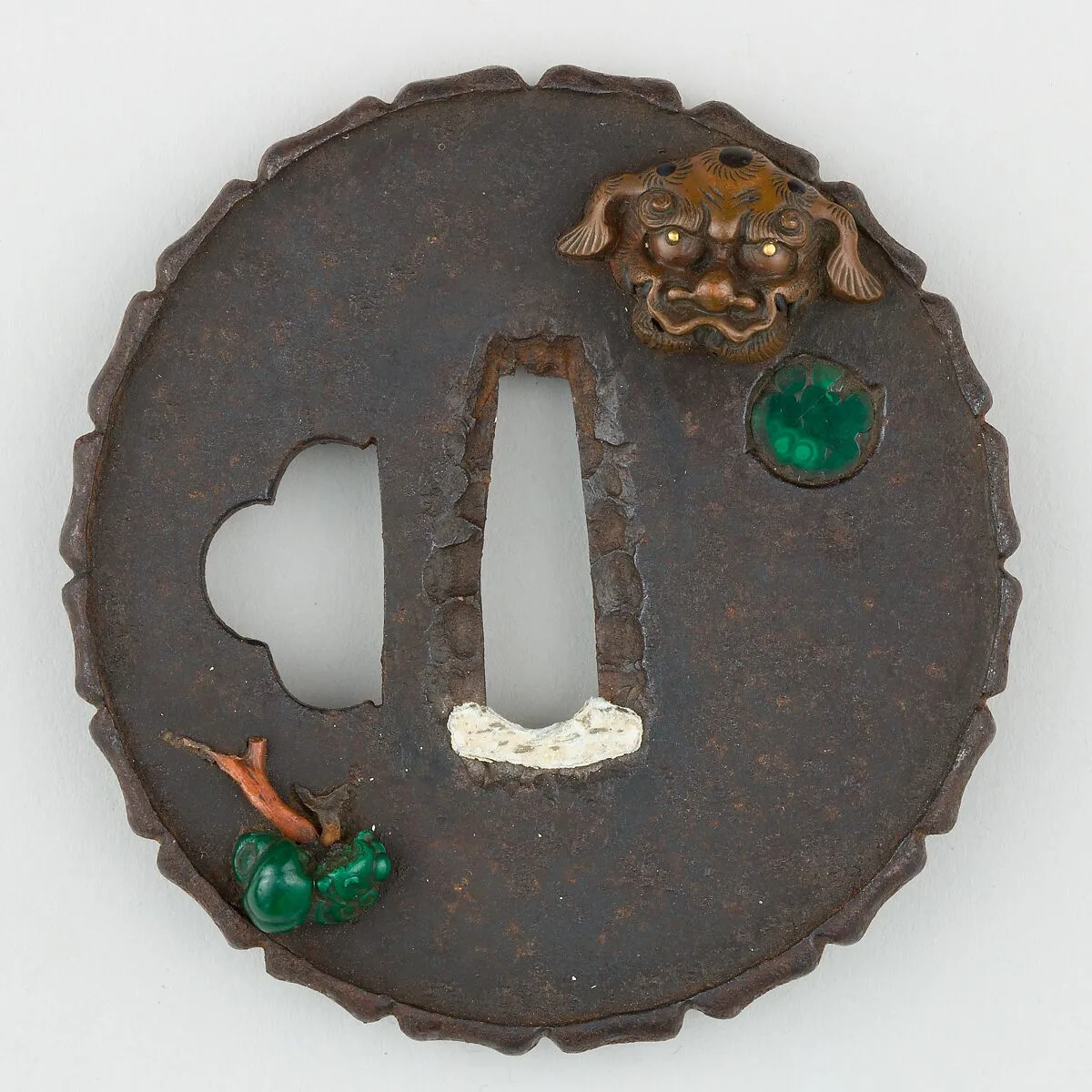 Sword Guard (<i>Tsuba</i>) Depicting an Arrangement of Masks (面散図鐔) — Unknown
