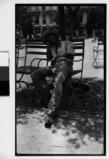 [Man Asleep in Chair in Park, Possibly Parque Fraternidad, Havana]