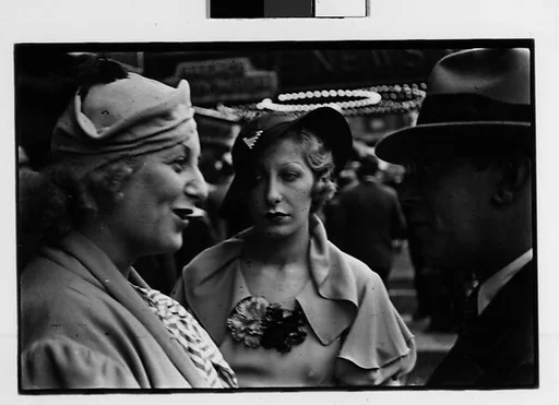 [Three 35mm Film Frames: Two Women and Man in Conversation on Street, New York City]