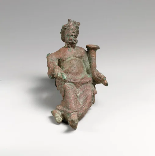 Bronze statuette of a god holding a cornucopia